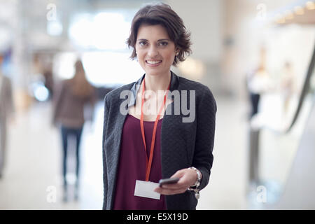 Portrait of young businesswoman in conference centre Stock Photo