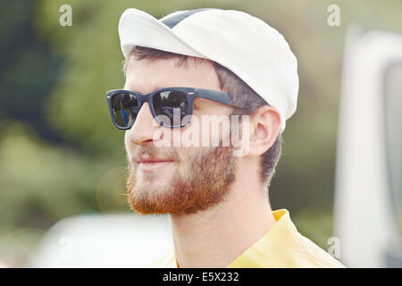 Cyclist wearing biking cap and sunglasses Stock Photo
