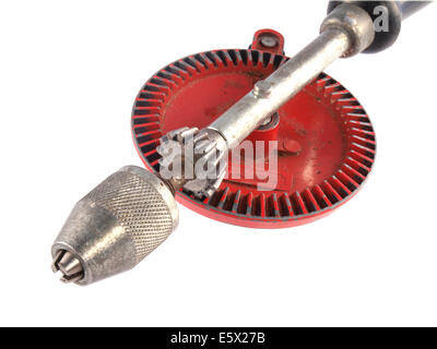 Old hand drill on a white background. Stock Photo
