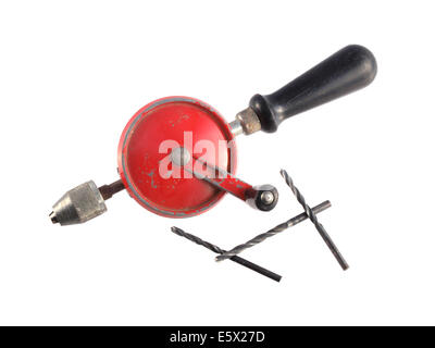 Old hand drill on a white background. Stock Photo