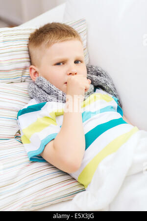 ill boy with flu at home Stock Photo