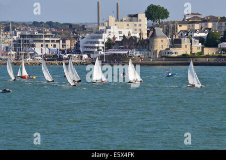 Isle of Wight, UK. 6th Aug, 2014. Aberdeen Asset Management Cowes Week, One Hour Victory' race off the Green, up to the Royal Yacht Squadron, starting at 1730, for the Victory class in recognition of its 80th anniversary this year. The race, in which each boat was crewed by a Cowes Week supporter, was won by Chatham Marine, ahead of Volvo and Solent Events. Credit:  Gary Blake/Alamy Live News Stock Photo