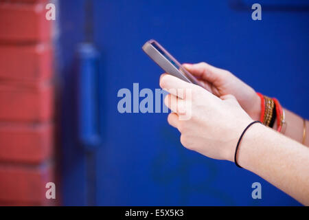 Close-up of women's hands using mobile phone Stock Photo