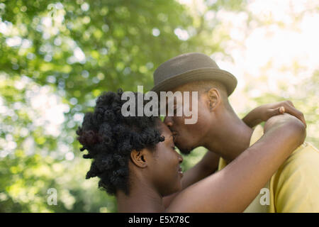 Romantic young couple in park Stock Photo