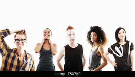Studio portrait of five young adults in a row Stock Photo