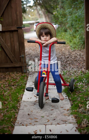 Serious looking 8-year old girl Stock Photo - Alamy