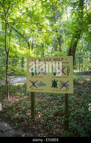 Ichetucknee River sign along pathway leading to Dampier's Landing where tubers can put in for a leisurely float down the river. Stock Photo