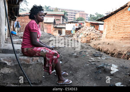 Kampala, Uganda. 10th Dec, 2013. DIANA TULYANRABO, beside boxing, is attending a nursing school. She remembers her fights and about 10 victories with a smile and feels almost invincible today. © Johan Bauza/ZUMA Wire/ZUMAPRESS.com/Alamy Live News Stock Photo