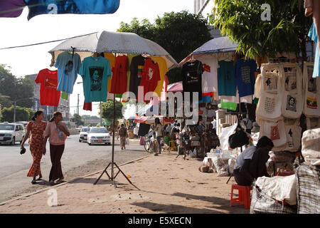 Souvenir T shirts depicting the face of Aung San Suu Kyi for sale on Bogyoke Aung San Road, central Yangon, Myanamar (Burma). Stock Photo