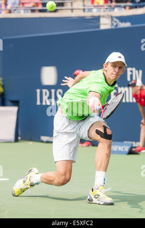 Toronto, Canada. 07th Aug, 2014. Kevin Anderson returns a serve during his match against Stan Wawrinka during the 2014 Rogers Cup being played in Toronto on August 7, 2014. Anderson went on to defeat Wawrinka 7-6, 7-5. Credit:  Mark Spowart/Alamy Live News Stock Photo