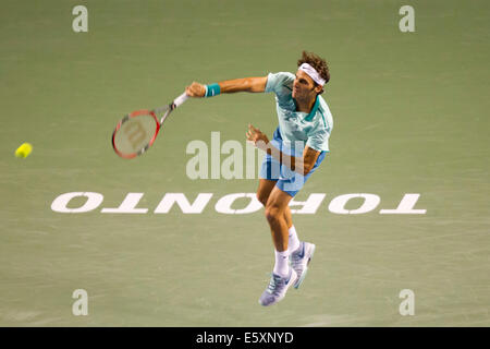 Toronto, Canada. 07th Aug, 2014. Roger Federer of Switzerland serves during the third round of men's singles against Marin Cilic of Croatia at the 2014 Rogers Cup in Toronto, Canada, Aug. 7, 2014. Roger Federer won the match 2-1. Credit:  Xinhua/Alamy Live News Stock Photo