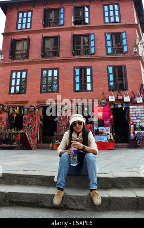Thai women in Swayambhunath Temple or Monkey Temple with Buddha eyes or ...