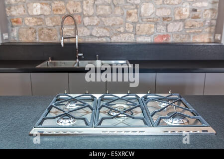 New fitted kitchen with built in gas hob Stock Photo