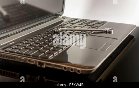 Open black laptop or notebook on white background Stock Photo
