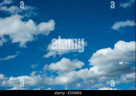 beautiful clouds against a dark blue sky Stock Photo