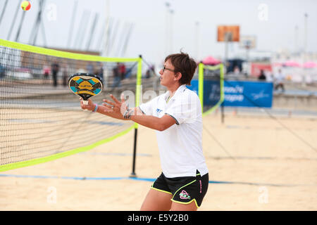 Beach Volley Ball Court, Kings Arches, Brighton Beach, Brighton, East Sussex, UK. Practice for competitors at the European Beach Tennis Championships, Brighton Seafront, Brighton, East Sussex, UK.  8th August 2014. David Smith/Alamy Live News Stock Photo