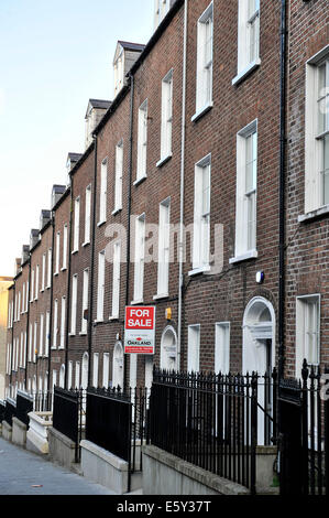 Georgian style three storey houses in Clarendon Street, Derry, Londonderry, built in 1840. Stock Photo