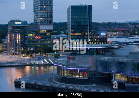 Panorama of Salford Quays and Media City in Manchester, UK at dusk, shot from the top of Quay West. Stock Photo