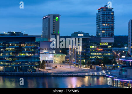 Panorama of Salford Quays and Media City in Manchester, UK at dusk, shot from the top of Quay West. Stock Photo