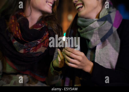 Friends bonding over cigarette Stock Photo