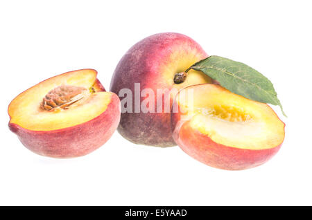 Peach in half isolated on a white background. Stock Photo