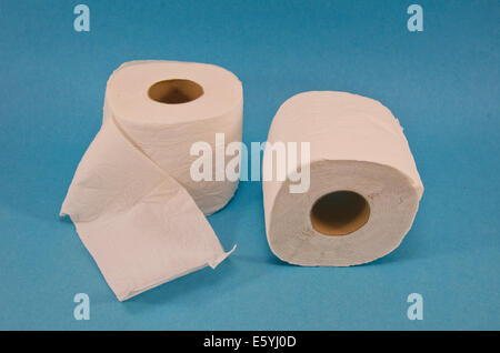 Soft Toilet Paper on blue background. Two white rolls Stock Photo