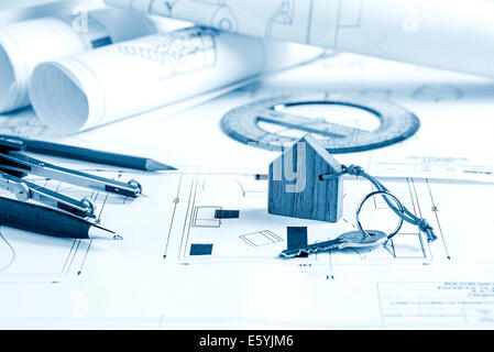 https://l450v.alamy.com/450v/e5yjm6/architect-worplace-with-blueprints-tools-and-house-key-e5yjm6.jpg