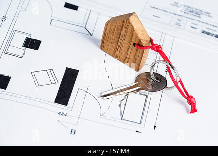 Closeup to key on house plan Stock Photo