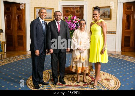 US President Barack Obama and First Lady Michelle Obama pose with Hailemariam Desalegn, Prime Minister of Ethiopia, and his wife Roman Tesfaye, in the Blue Room of the White House before the U.S.-Africa Leaders Summit dinner August 5, 2014 in Washington, DC. Stock Photo