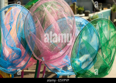 Pink fishing nets for kids Stock Photo - Alamy