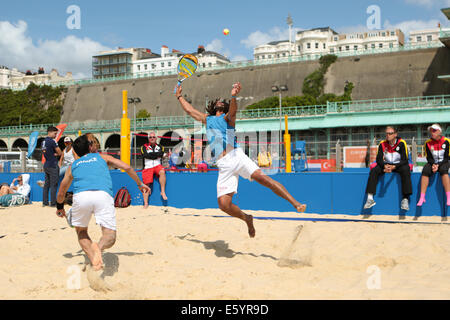 City of Brighton & Hove, East Sussex, UK. European Beach Tennis Championships 2014 Brighton, Yellow Wave, Madeira Drive, Brighton, Sussex, UK. In this image is a men's doubles semi final between teams from Italy and France, in shot . 9th August 2014. David Smith/Alamy Live News Stock Photo