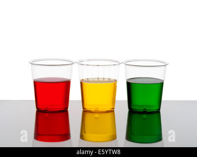 Bright traffic light coloured drinks. Drink drive warning maybe. Stock Photo