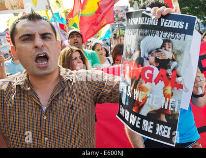 Frankfurt Main, Germany. 09th Aug, 2014. More than 1,500 Kurds and Yazidi take part in a protest rally in Frankfurt Main, Germany, 09 August 2014. They protested against the invasion of large parts of the Iraq by the jihadist group Islamic State (IS). Photo: BORIS ROESSLER/DPA/Alamy Live News Stock Photo