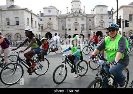 London, UK. 9th August 2014. Some of the 24,000 cyclists who took part in the Ride London 2014 cycling on bicycles through central London Credit:  Paul Brown/Alamy Live News Stock Photo