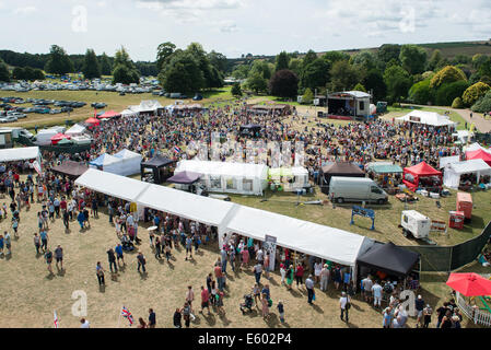 West Dean, Chichester, UK. 9th August, 2014. A general view of the stadium area and surrounding food stalls at the Chilli Fiesta taken from the ferris wheel onsite in the fairground area Credit:  MeonStock/Alamy Live News Stock Photo