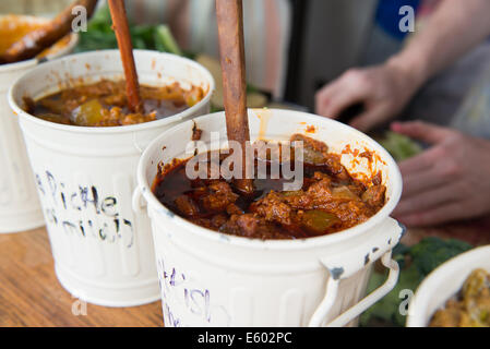West Dean, Chichester, UK. 9th August, 2014. hot pickles in tubs for sale taken on the Whambam food stall at the Chilli Fiesta at West Dean, August 2014. UK weather.  Credit:  MeonStock/Alamy Live News Stock Photo