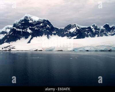 Reflection across the waters on the Antarctic Peninsula, near Port Lockroy, British Antarctic base Stock Photo
