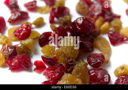 Dried Raisins And Cranberries Isolated On The White Background Stock Photo