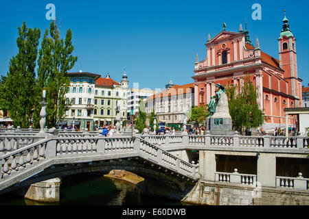 Slovenia, Ljubljana, Franciscan church and the Triple Bridge Stock Photo