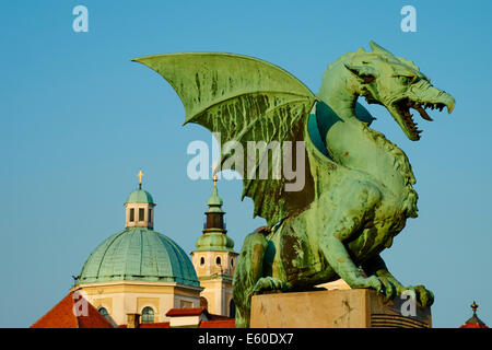 Slovenia, Ljubljana, Dragon Bridge and St Nicholas church Stock Photo