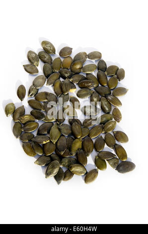 Green pumpkin seeds isolated on the white background Stock Photo
