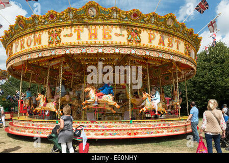 Children And Adults Enjoying The Vintage Carousel Ride At Lakeside 