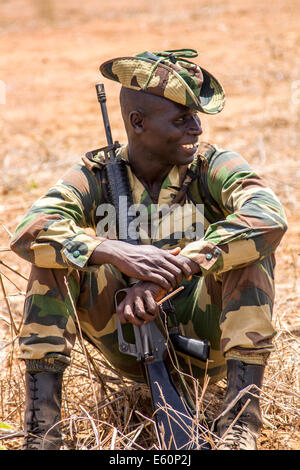A Senegalese soldier takes a break after crowd control training conducted by U.S. Marines during Western Accord 14 June 17, 2014 in Thies, Senegal. Stock Photo