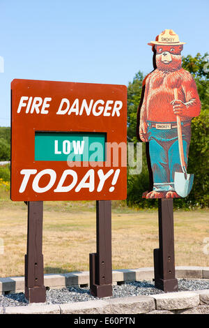 A Smokey Bear and forest fire danger sign in the White Mountains Stock ...