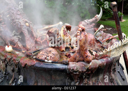 Closeup of pot of boiling body parts - part of Three Fates Sculpture at the NJ Grounds for Sculpture Stock Photo