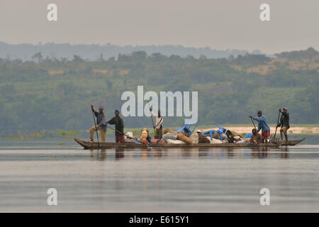 Fishermen on a pirogue on the Congo River, near Tshumbiri, Bandundu Province, Democratic Republic of the Congo Stock Photo