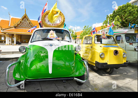 BMW Isetta, vintage car exhibition, Wat Ratchanatda at the back, Bangkok, Thailand Stock Photo