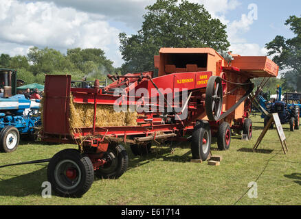vintage threshing machine and baler / bailing at show rally Stock Photo