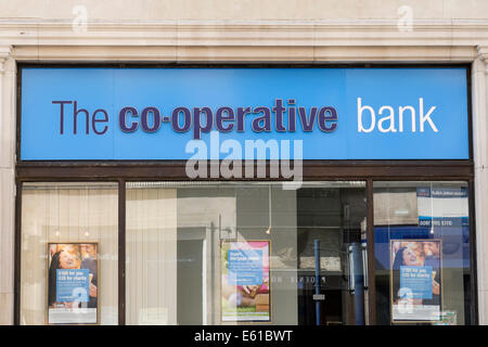 The Co-operative Bank sign above the window. Manchester, England, UK, Britain Stock Photo