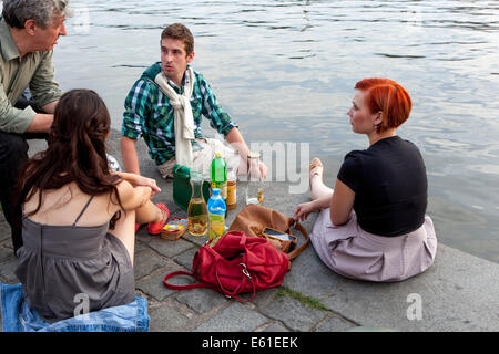 Naplavka is a promenade along the Vltava River, a meeting place and a lot of space for leisure activities Prague, Czech Republic Stock Photo